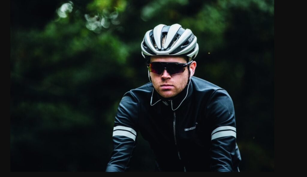 Cyclist using music to stay motivated during a long-distance bike ride.