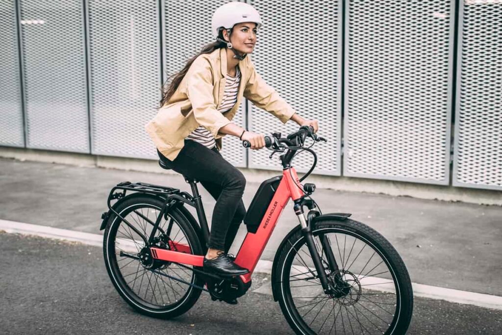 Commuter using an electric bike in the city